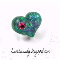 Adjustable sparkly green heart ring