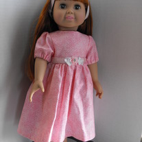Pink floral dress with puff sleeves and headband