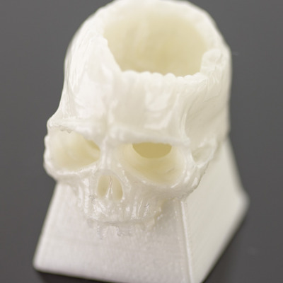 Pearl skull keycap