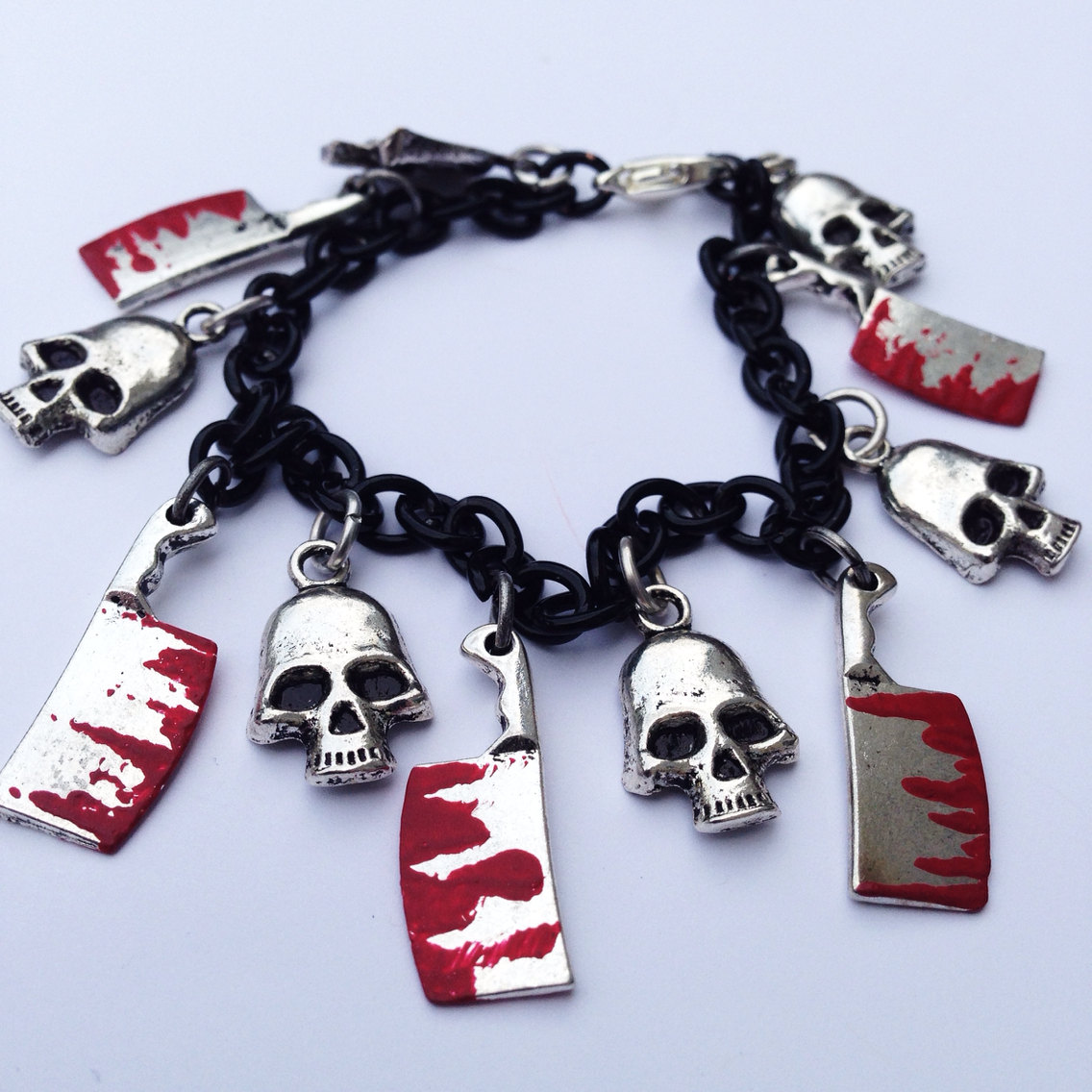 Hacked Up Bloody Meat Cleavers and Skulls Bracelet on Storenvy