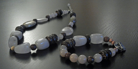 Rose quartz, jasper, and wooden beads. Necklace and bracelet.