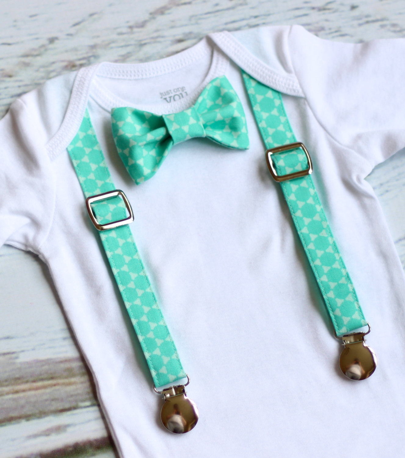 light blue suspenders and bow tie