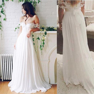 simple white flowy wedding dress